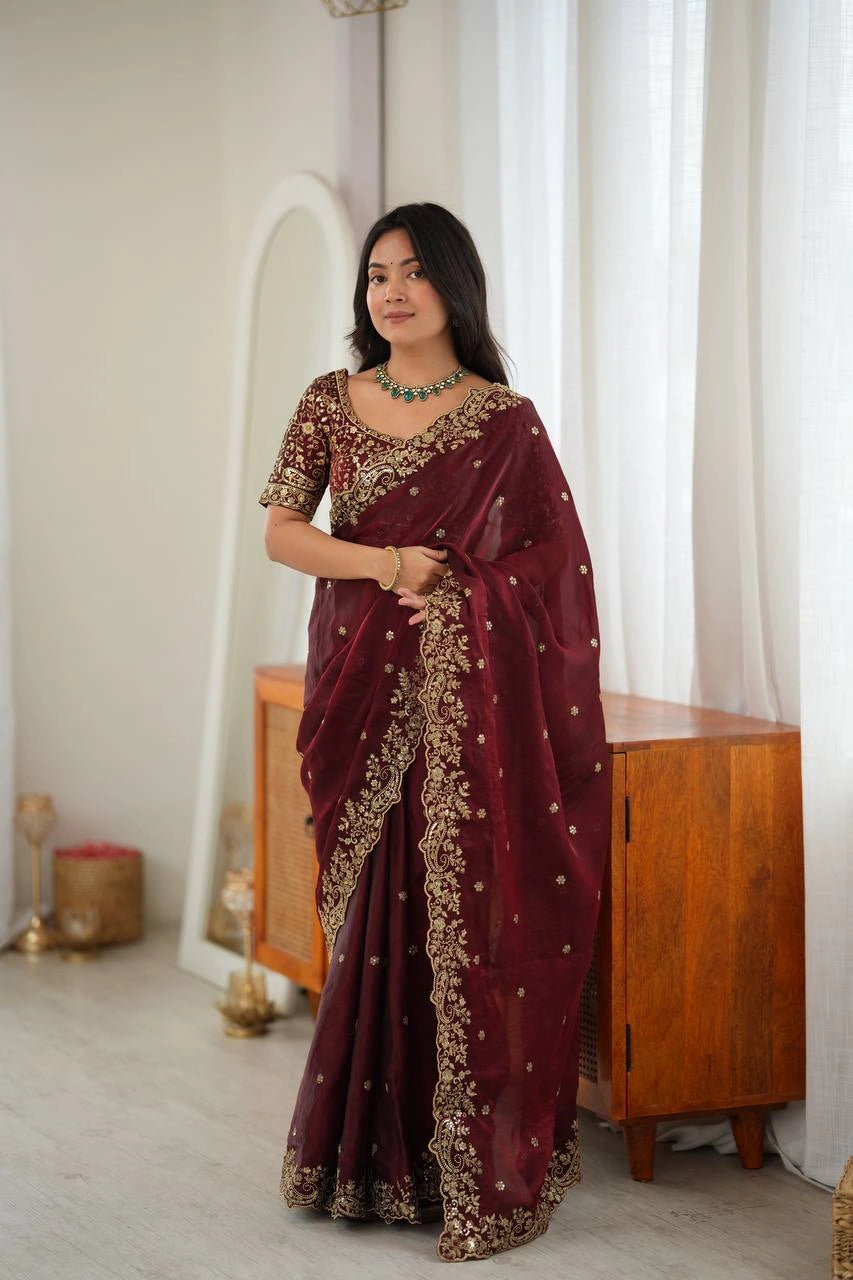 Maroon sequins embroidered saree draped on model front pleats